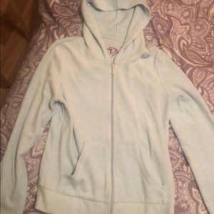 Blue juicy couture zip up, gold writing on back